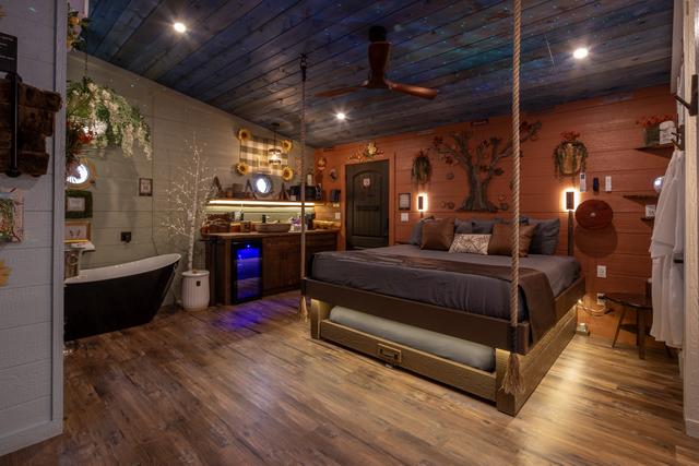 ROPE SUSPENDED KING BED - SECRET ROLL OUT QUEEN UNDERNEATH - LUXURY BEDDING IS PROVIDED