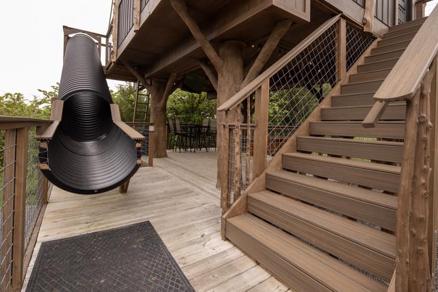 LOWER DECK - 20-FOOT SLIDE - 19TH HOLE TREEHOUSE - SANCTUARY TREEHOUSE RESORT IN THE SMOKIES