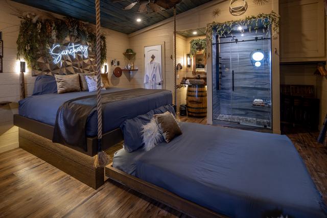 ROPE SUSPENDED KING BED WITH A SECRET ROLL OUT QUEEN BED - LUXURY LINES ARE PROVIDED