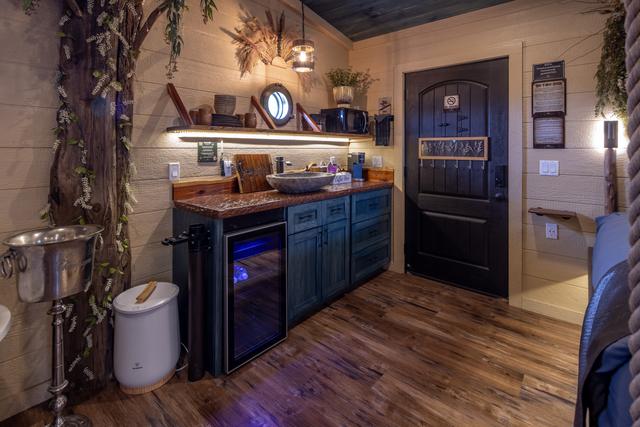 KITCHENETTE - MICROWAVE - KEURIG COFFEE MAKER - MINI FRIDGE - STOCKED COFFEE CADDY - ICE BUCKET - CHARCUTERIE BOARD - FIRST AID KIT - COOKING/CLEANING SUPPLIES - SOAPS, TOWELS, PAPER PRODUCTS, TRASH BAGS, AND MORE PROVIDED