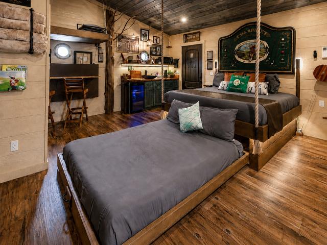 CRANK THE WHEEL ON THE WALL AND REVEAL A QUEEN BED - LUXURY LINES ARE PROVIDED