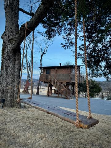 4 PERSON SWING AT SANCTUARY TREEHOUSE RESORT