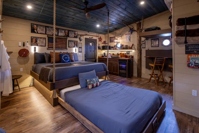 CRANK THE WHEEL ON THE WALL AND REVEAL THE SECRET ROLL OUT QUEEN BED - LUXURY LINENS ARE PROVIDED