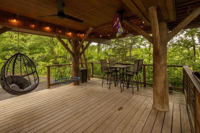 LOWER DECK - TREE-MENDOUS FUN TREE FORT TREEHOUSE - SLEEPS 6 - WOODED VIEW