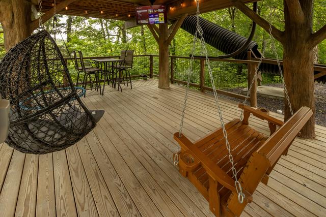 LOWER DECK - TREE-MENDOUS FUN TREE FORT TREEHOUSE - WHY STAY AT THE USUAL CABIN OR HOTEL WHEN YOU CAN EXPERIENCE A TREEHOUSE STAY IN THE SMOKY MOUNTAINS?!
