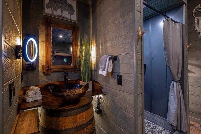 CUSTOM JACK DANIELS' WHISKEY BARREL VANITY SINK - RAIN SHOWER - MAGNIFYING MIRROR - AND MORE - LUXURY LINENS AND TOILETRIES ARE PROVIDED