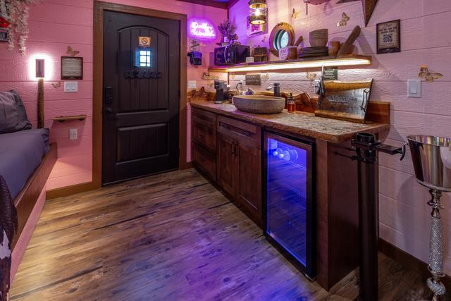 KITCHENETTE - KEURIG COFFEE MAKER - MICROWAVE - MINI FRIDGE - DRINK CHUTE - STOCKED COFFEE CADDY - BOTTLED WATER - COOK WARE - SERVICE WEAR - GRILLING TOOLS - CLEANING AND FOOD STORAGE SUPPLIES - PAPER PRODUCTS PROVIDED