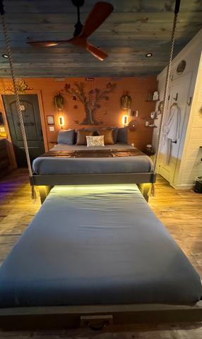 CRANK THE WHEEL ON THE WALL AND REVEAL A COMFORTABLE QUEEN BED WITH LUXURY LINENS