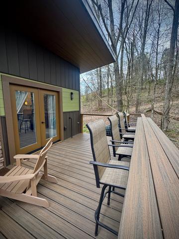 UPPER DECK - BAR TOP SEATING FOR FOUR - GAS WEBER GRILL - FRENCH DOORS TO THE INSIDE OF THE TREEHOUSE