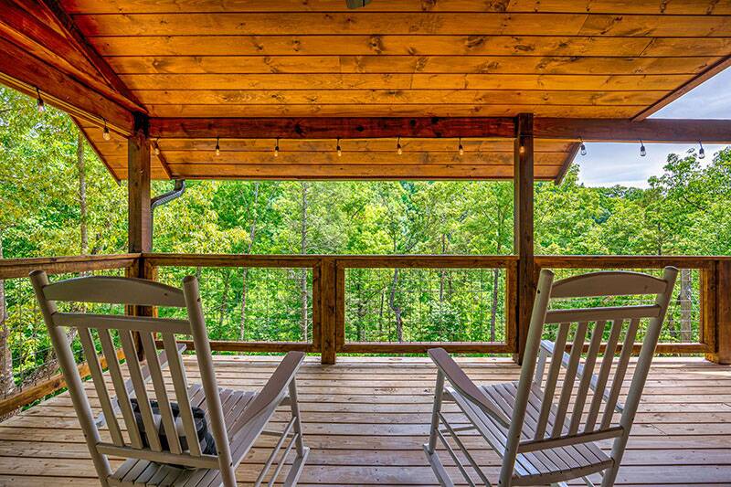 Relaxing rockers on the porch of your cabin in the Smokies. at Big Splash Lodge in Gatlinburg TN
