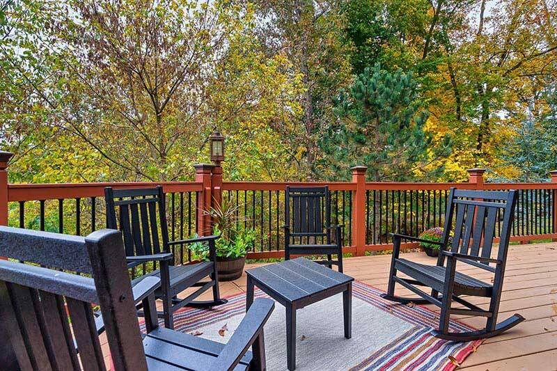 Several deck rockers from which to enjoy the Smokies outdoors. at Alpine Oasis in Gatlinburg TN