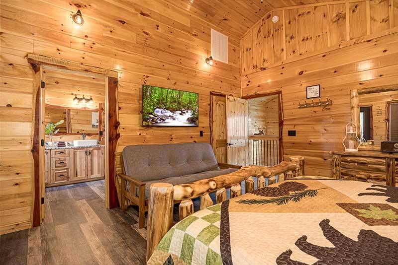 Relax in your cabin's spacious master bedroom. at Morning View in Gatlinburg TN