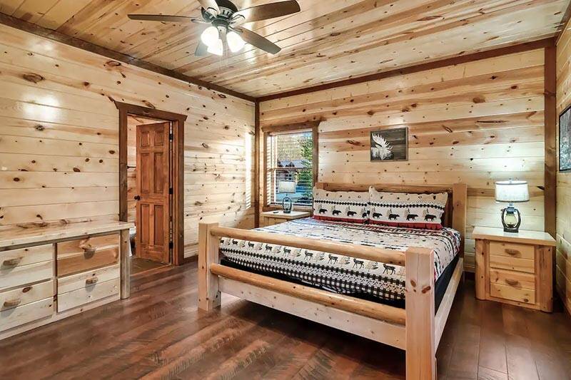 First bedroom of your 8BR cabin in the Tennessee Smoky Mountains. at Cabin Fever Vacation in Gatlinburg TN