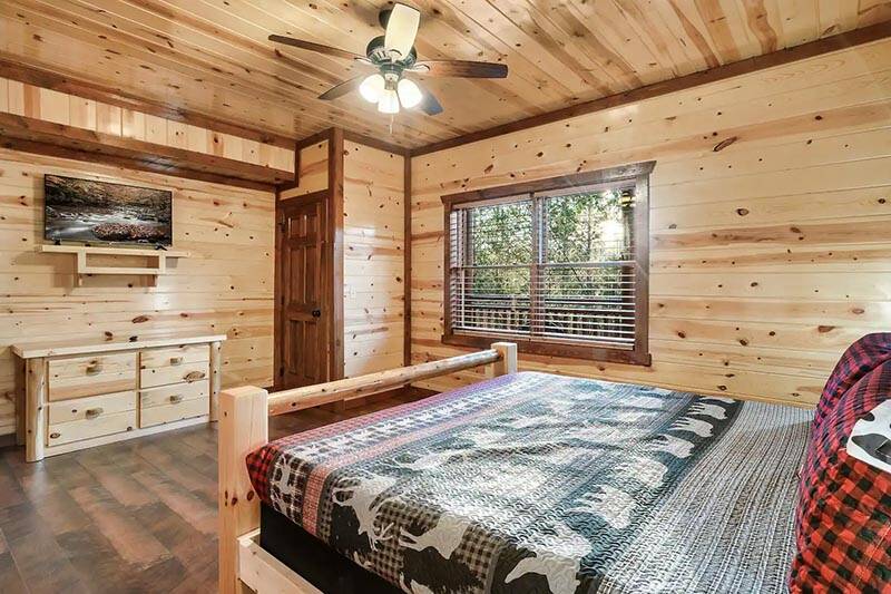 Spacious 2nd bedroom with its personal television. at Cabin Fever Vacation in Gatlinburg TN
