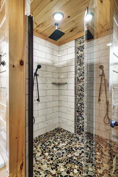 Cabin's stone shower with rain faucet. at Enchanted Spirit in Gatlinburg TN