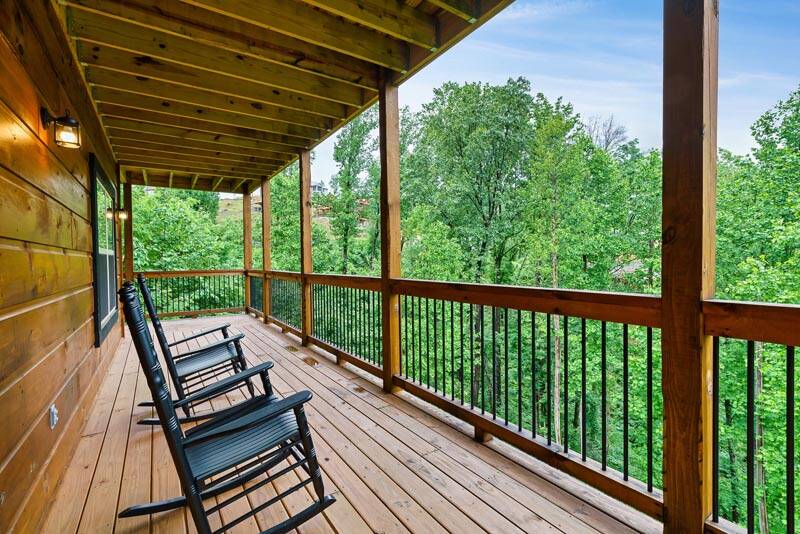 Enjoy relaxation in a rocker at your Smoky Mountains cabin rental. at Enchanted Spirit in Gatlinburg TN