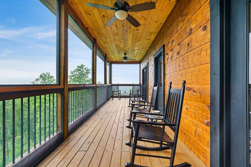 Your cabin in the Smokies offers several rockers to take in the views from. at Enchanted Spirit in Gatlinburg TN