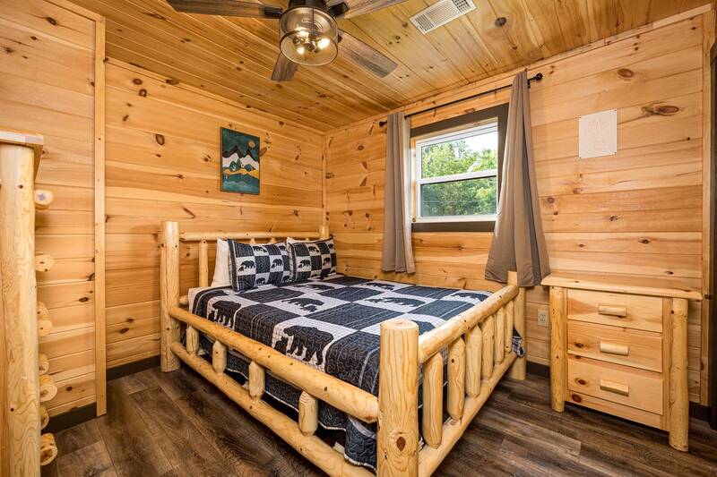 Comfortable cabin log bed in the Smokies. at Mountain Creek View in Gatlinburg TN