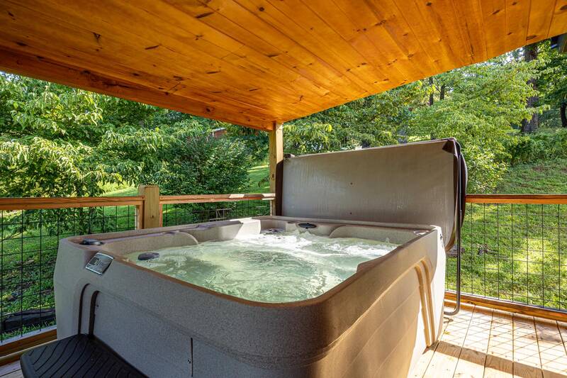 Smoky Mountain cabin rental hot tub. at Mountain Creek View in Gatlinburg TN