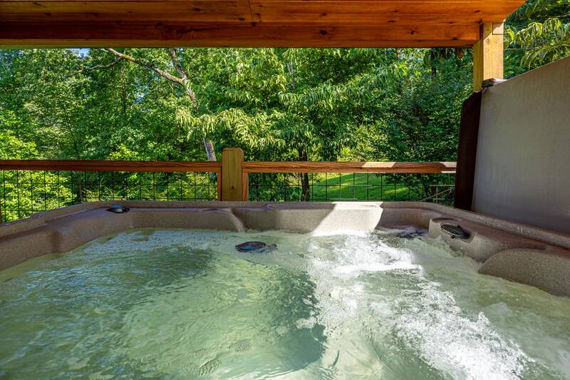 Family sized hot tub at your cabin rental in the Smokies. at Mountain Creek View in Gatlinburg TN