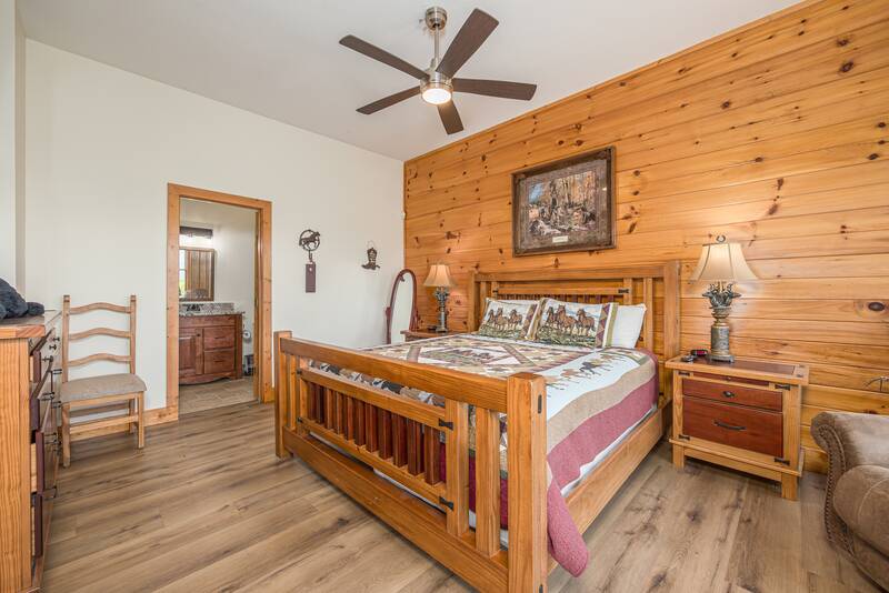 Start your day from this king sized bed. at Five Bears Mountain View Lodge in Gatlinburg TN