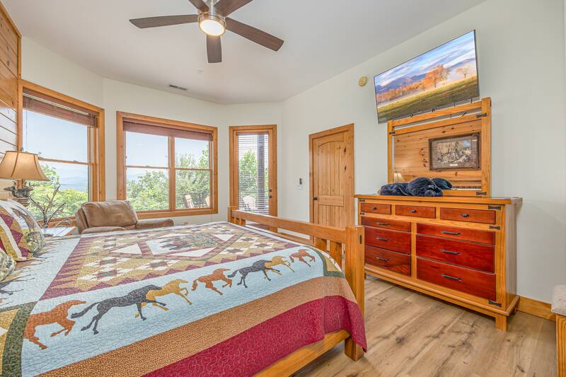 Take in the Smoky Mountain views from your bedroom windows. at Five Bears Mountain View Lodge in Gatlinburg TN