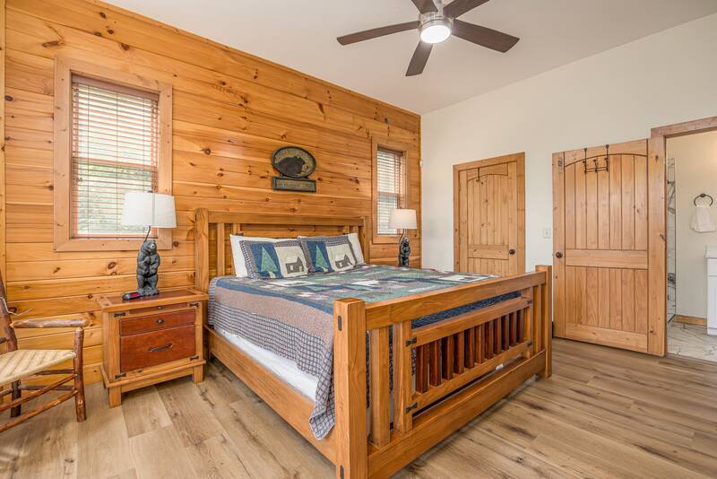 Lot to do in the Smokies and it's great to relax in this king sized bed. at Five Bears Mountain View Lodge in Gatlinburg TN