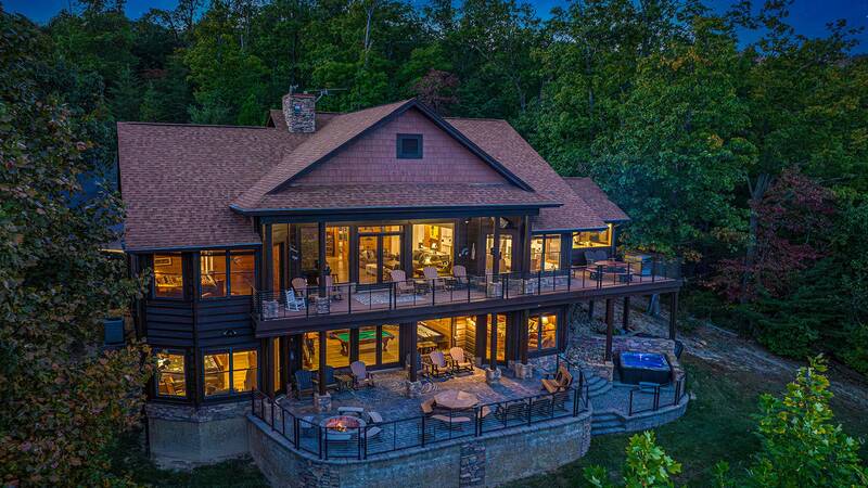 A night photo of your big cabin in the Smoky Mountains of Tnnessee. at Five Bears Mountain View Lodge in Gatlinburg TN