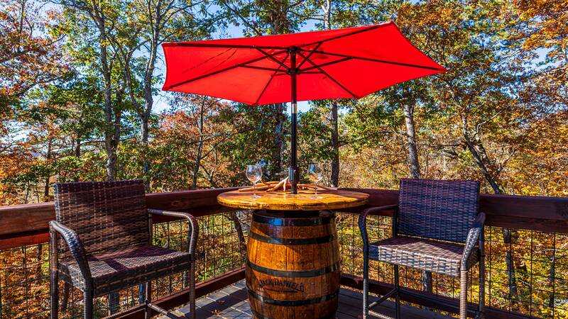 Chill out at the whiskey barrel table. at Stonehenge Cabin in Gatlinburg TN
