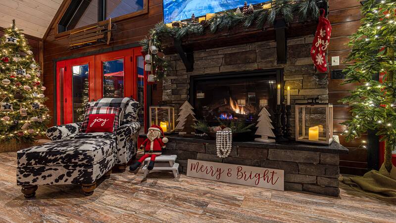 Family will love sitting by the fireplace with hot chocolate. at Stonehenge Cabin in Gatlinburg TN