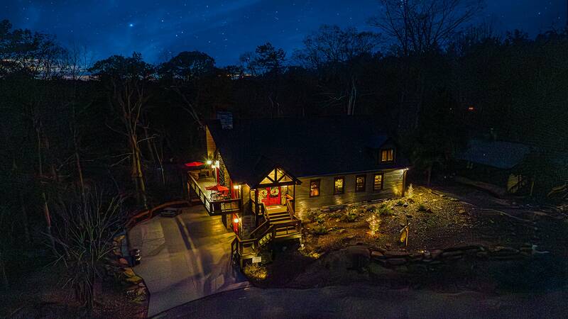 A beautiful nightime aerial of your cabin in the Smoky Mountains. at Stonehenge Cabin in Gatlinburg TN