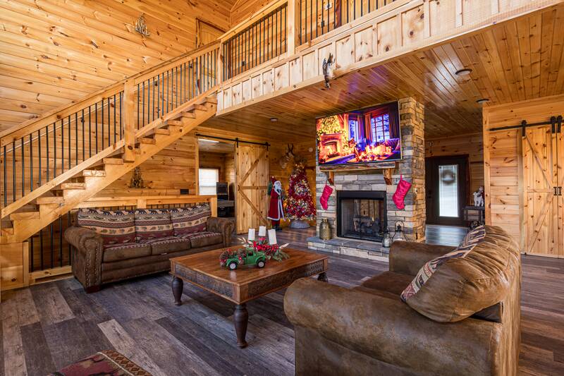 Christmas stockings hung carefully about the cabin's fireplace. at Sunset Peak in Gatlinburg TN