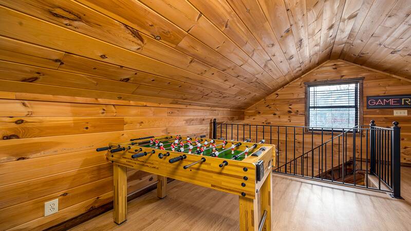 Foosball in your cabin rental's gameroom. at Mountain Whispers in Gatlinburg TN