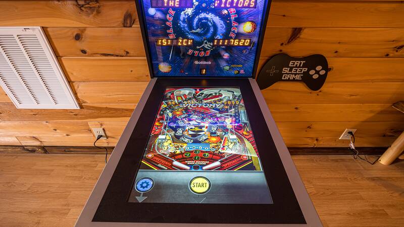 Pinball in your cabin rental's gameroom. at Mountain Whispers in Gatlinburg TN