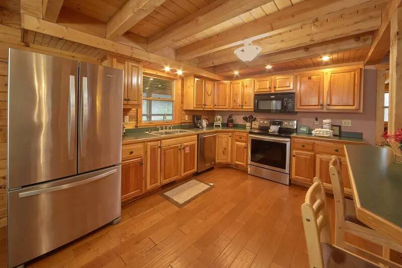 Fully equipped kitchen at your rental cabin in the Smokies. at Wrap Around The Son in Gatlinburg TN