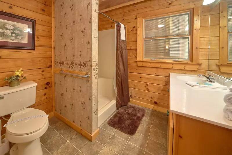 Full bath of your second cabin bedroom. at Wrap Around The Son in Gatlinburg TN