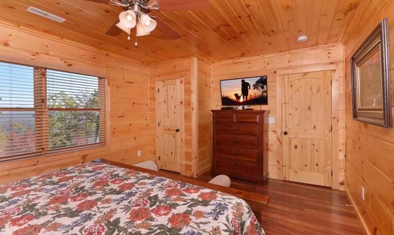 Watch television before heading off to sleep and wake to scenic mountain views.  at Mother's Dream in Gatlinburg TN
