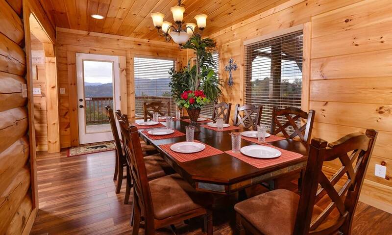 Cabin dining room with Smoky Mountain views. at Mother's Dream in Gatlinburg TN