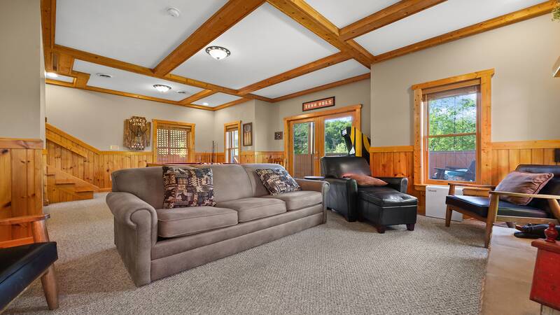 Plenty of seating for the family while enjoying your cabin's game room. at Moonlight Pines Lodge in Gatlinburg TN