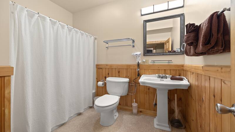 First of your cabin's three full bathrooms. at Moonlight Pines Lodge in Gatlinburg TN