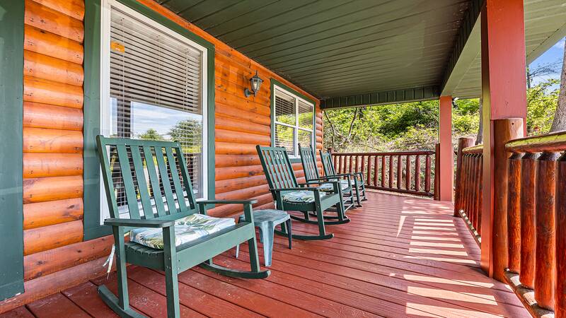 Your Smoky Mountains cabin getaway offers several rockers for taking in nature while just relaxing. at Bear Crossing in Gatlinburg TN