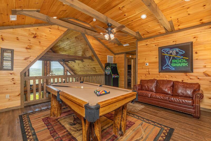 Gather the family round the loft pool table for hours of indoor fun. at The Appalachian in Gatlinburg TN