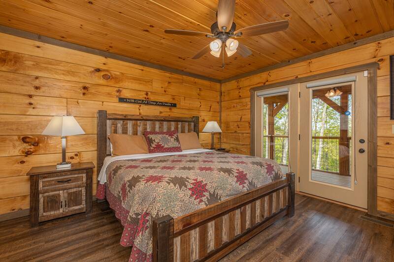 Rustic furnishings in your 5 bedroom cabin's second bedroom.  at The Appalachian in Gatlinburg TN