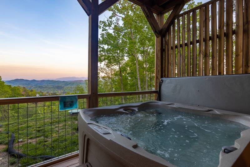 Large hot tub with scenic views of the Smoky Mountains. at The Appalachian in Gatlinburg TN