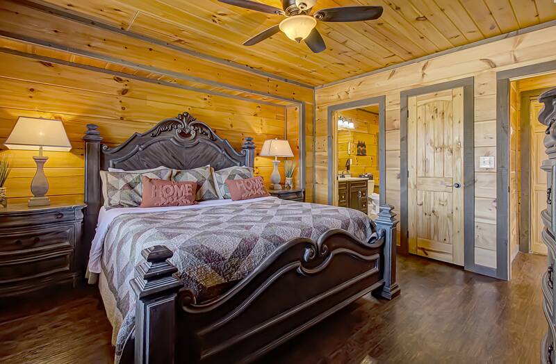 King sized bed at your Smoky Mountains cabin rental. at A Point of View in Gatlinburg TN