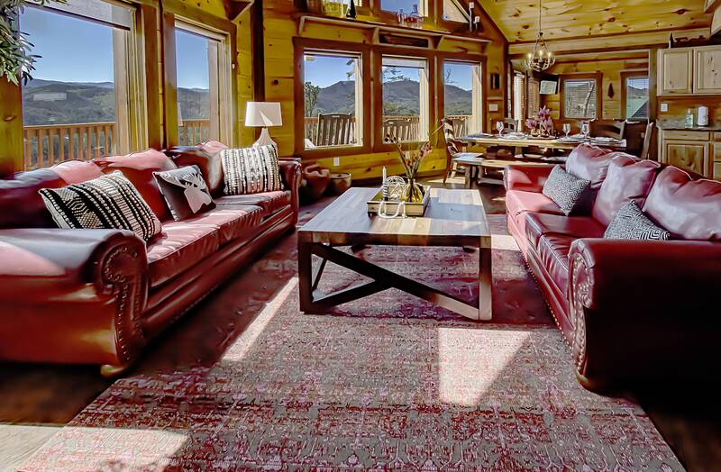 Enjoy Smoky Mountain views from your cabin's large glass windows. at A Point of View in Gatlinburg TN