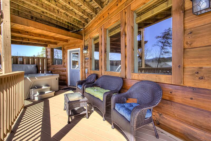 Some of the porch seating at your cabin in the Smokies. at A Point of View in Gatlinburg TN