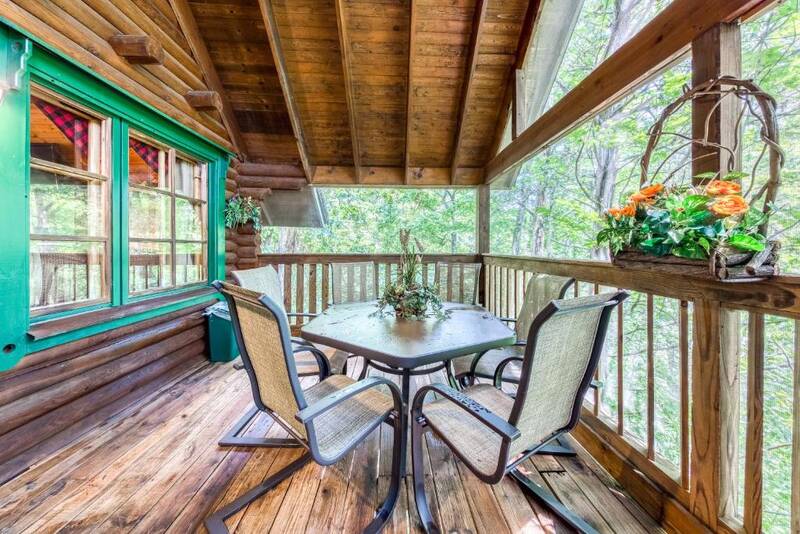 Porch seating for meals in the forest. at Moose Lodge in Gatlinburg TN