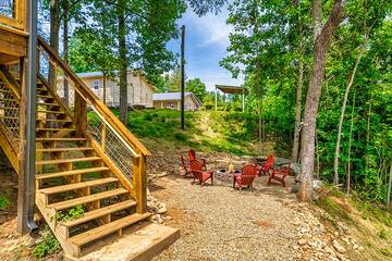 Stairs leading down to the cabin's fire pit.