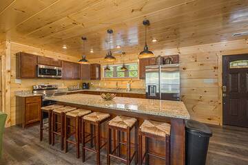 Plenty of seating at the breakfast bar of your cabin.
